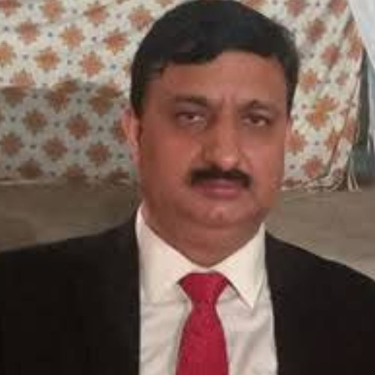 H.L. Dhar
